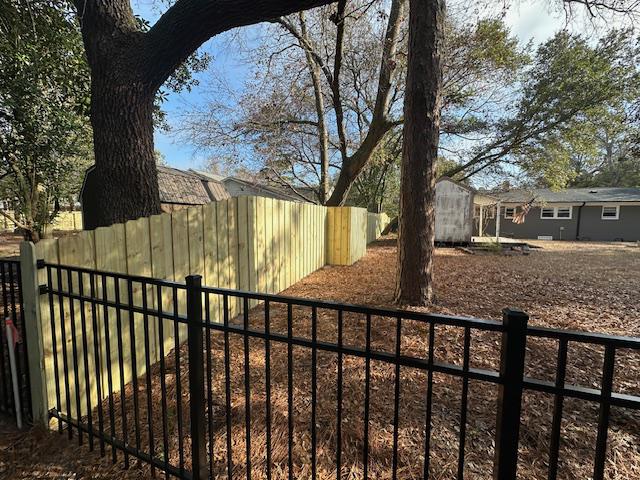 Board on Board & Ornamental Metal Combination Fence