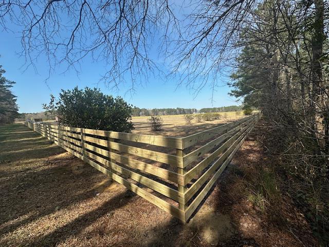 wood ranch rail fence installed by top rail fence