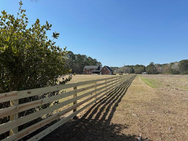 wood ranch rail fence installed by top rail fence