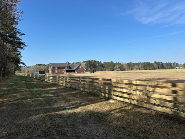 wood ranch rail fence installed by top rail fence