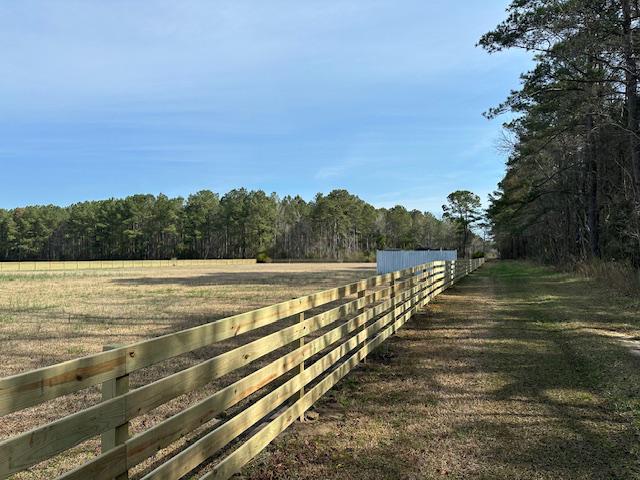 wood ranch rail fence installed by top rail fence