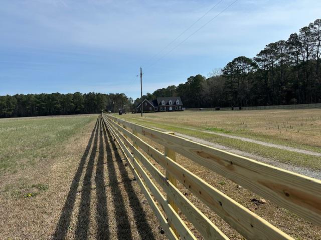 wood ranch rail fence installed by top rail fence