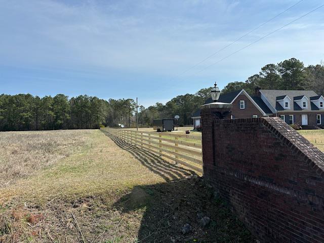 wood ranch rail fence installed by top rail fence