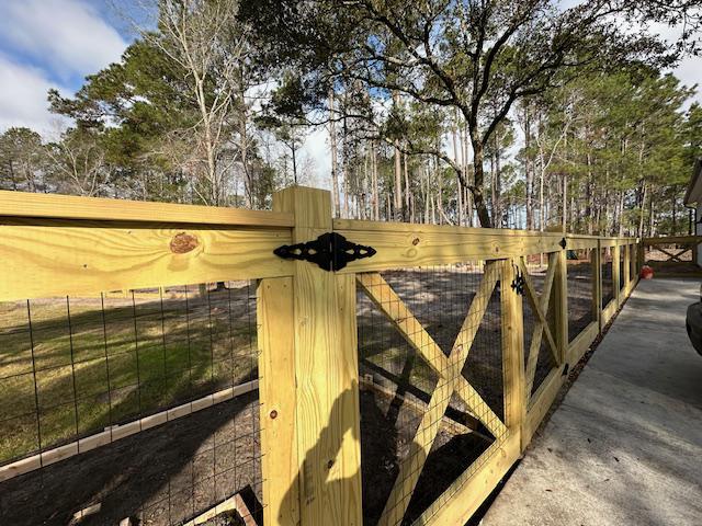 welded wire wood fence installed by top rail fence