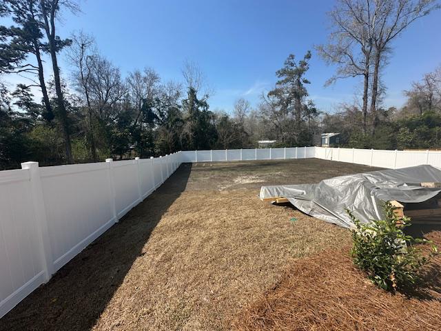 vinyl privacy fence installed by top rail fence
