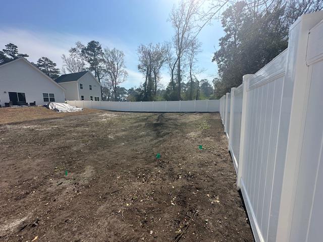 vinyl privacy fence installed by top rail fence