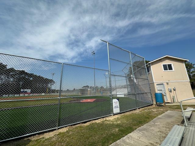 galvanized chain link fence installed by top rail fence