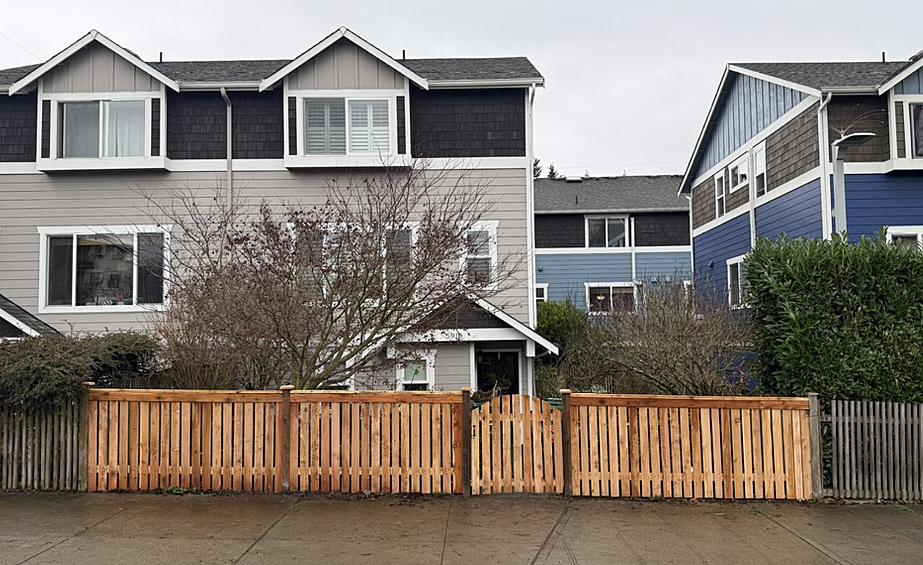 spaced board fence installed by top rail fence