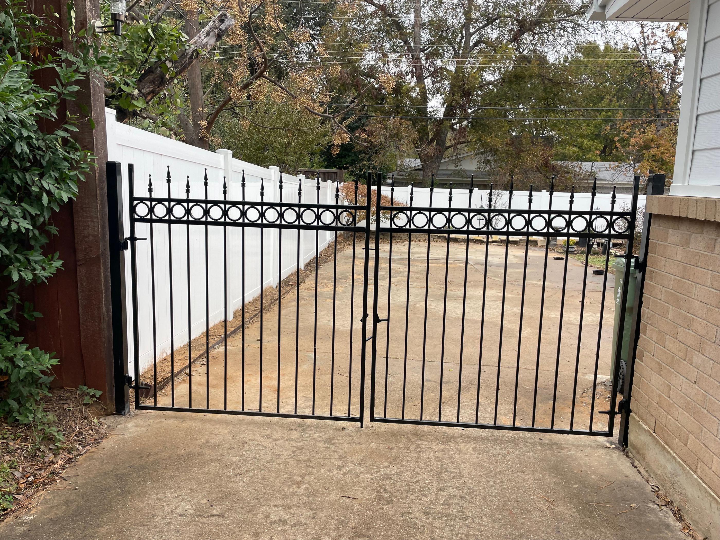 Elegant White Vinyl & Wrought Iron Fence Installation