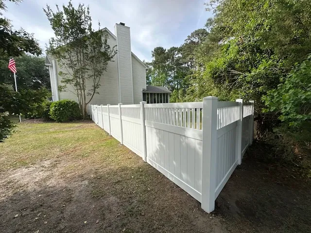 vinyl privacy fence installed by top rail fence