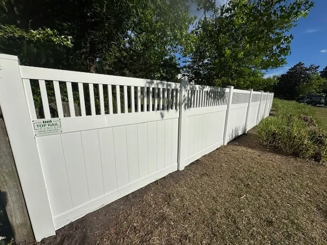 vinyl privacy fence installed by top rail fence