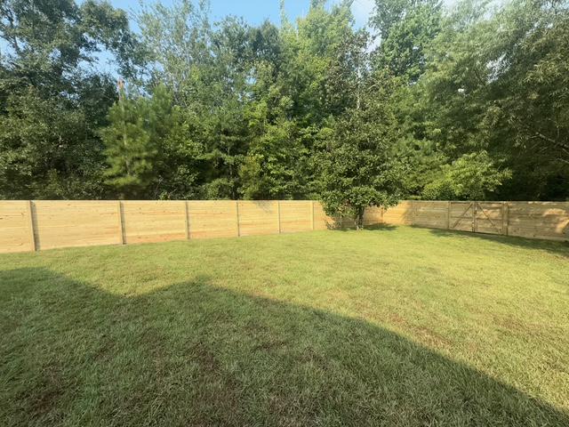 wood horizontal fence installed by top rail fence