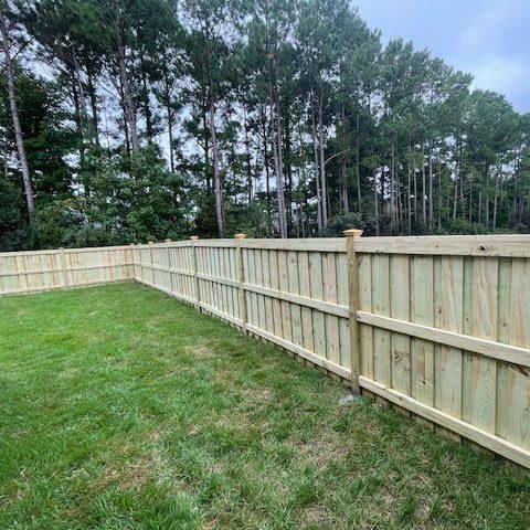 wood fence board on board with cap and trim 3