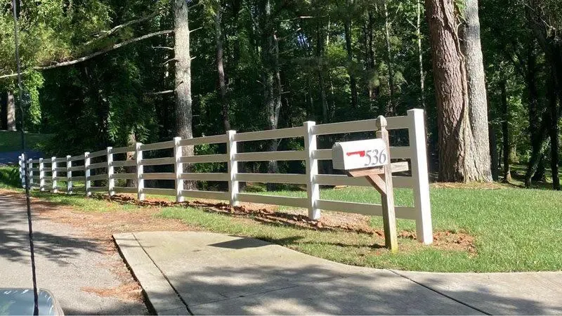 vinyl ranch rail fence installed by top rail fence