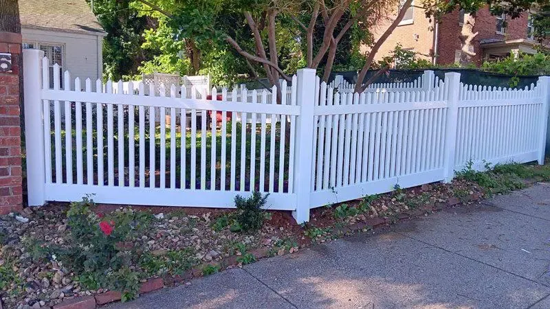 vinyl picket fence installed by top rail fence