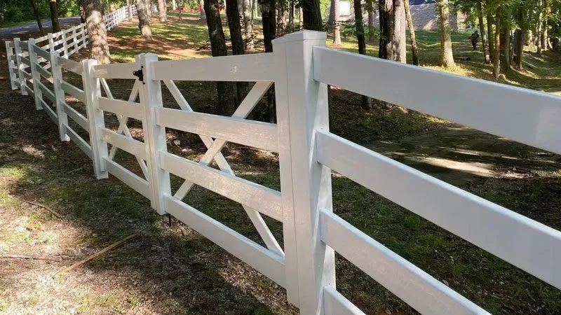 vinyl ranch rail fence installed by top rail fence