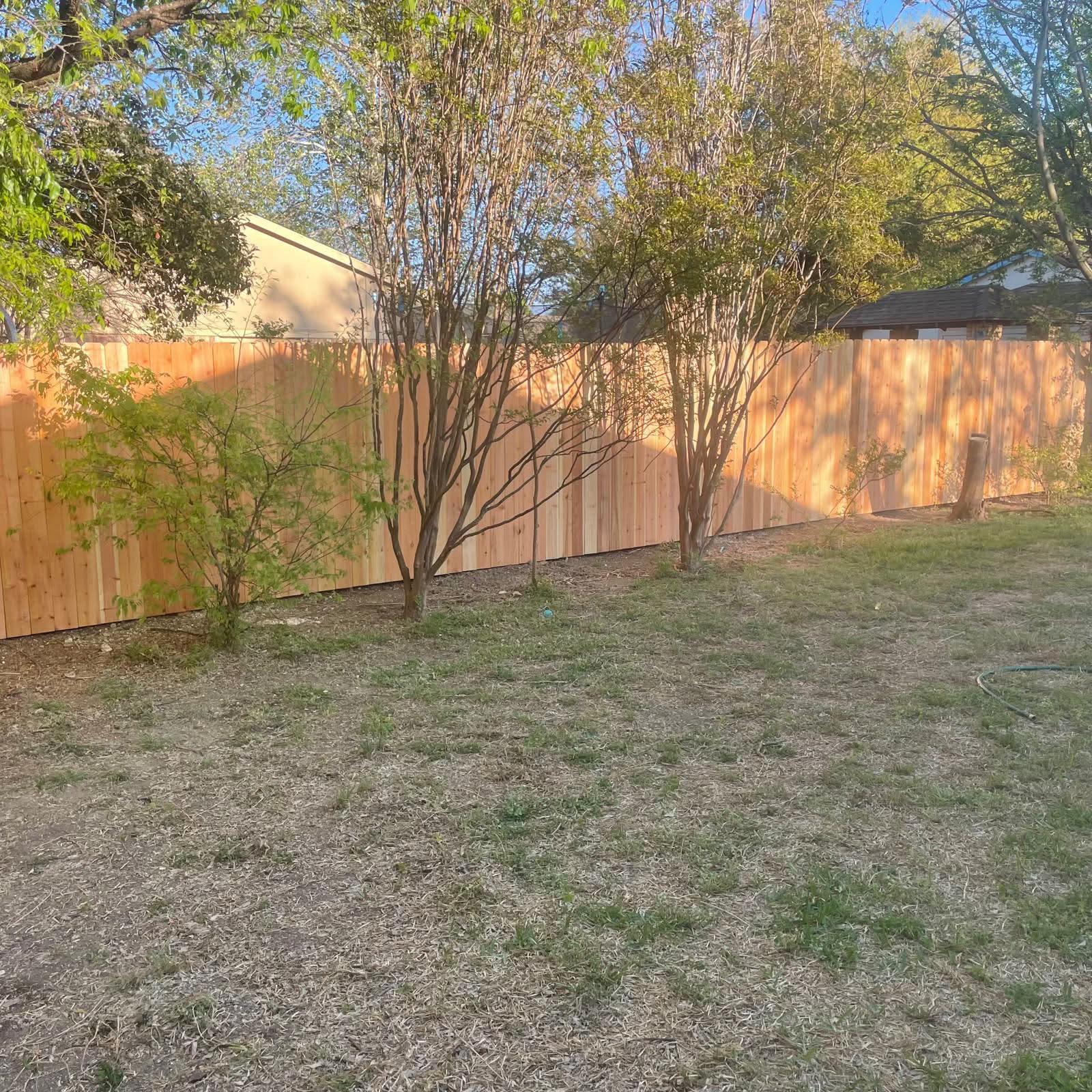 side by side wood fence installed by top rail fence