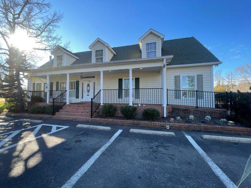 ornamental metal railing installed by top rail fence