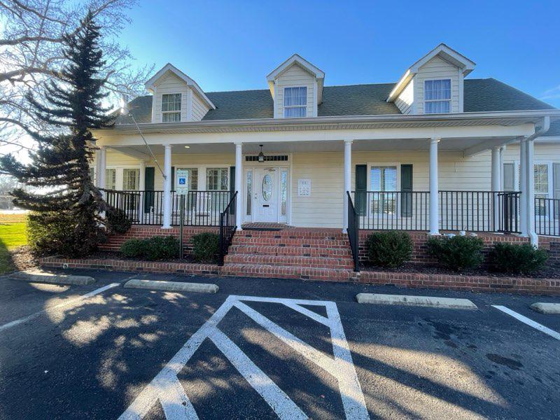 ornamental metal railing installed by top rail fence