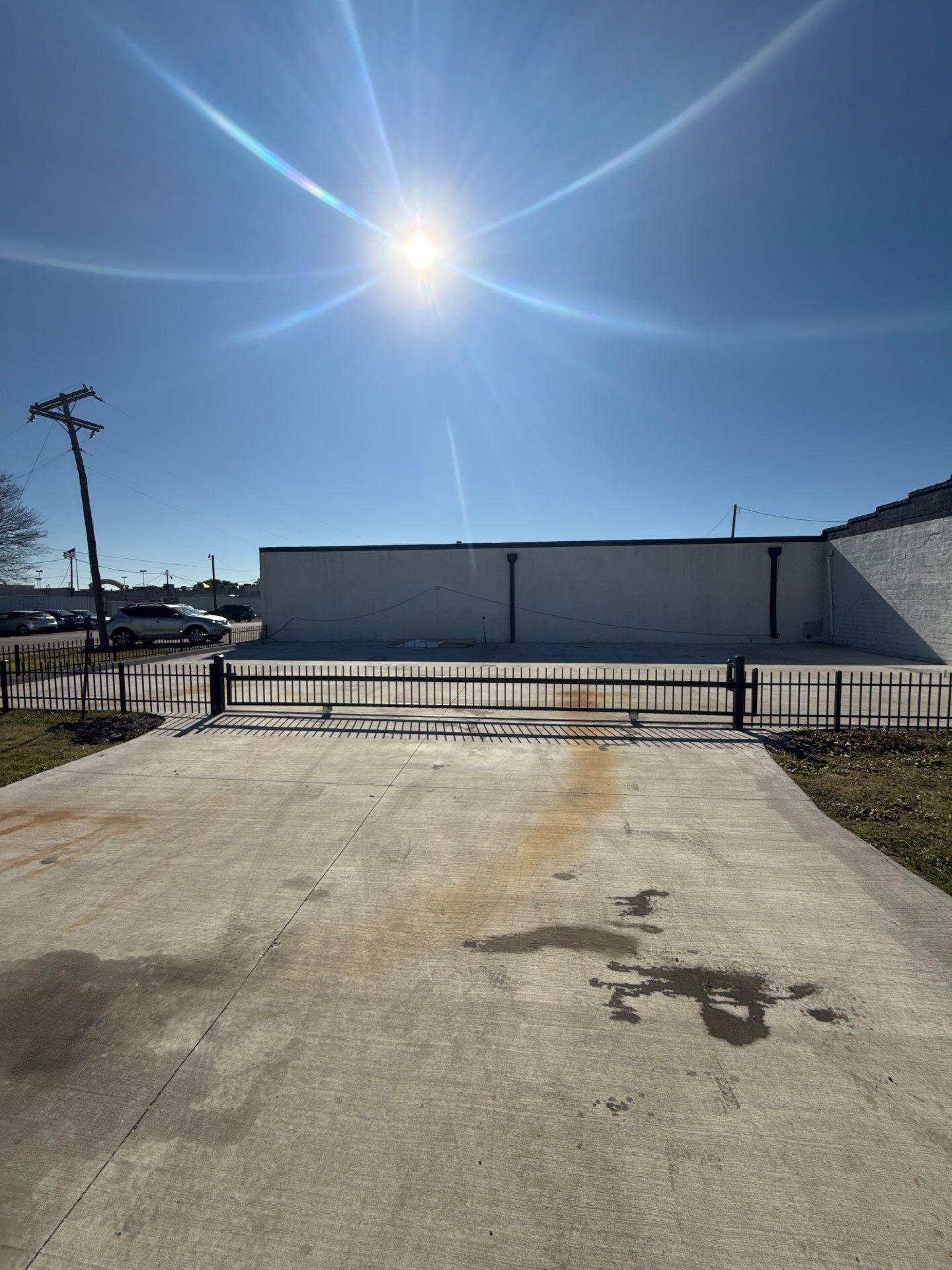 ornamental metal fence installed by top rail fence