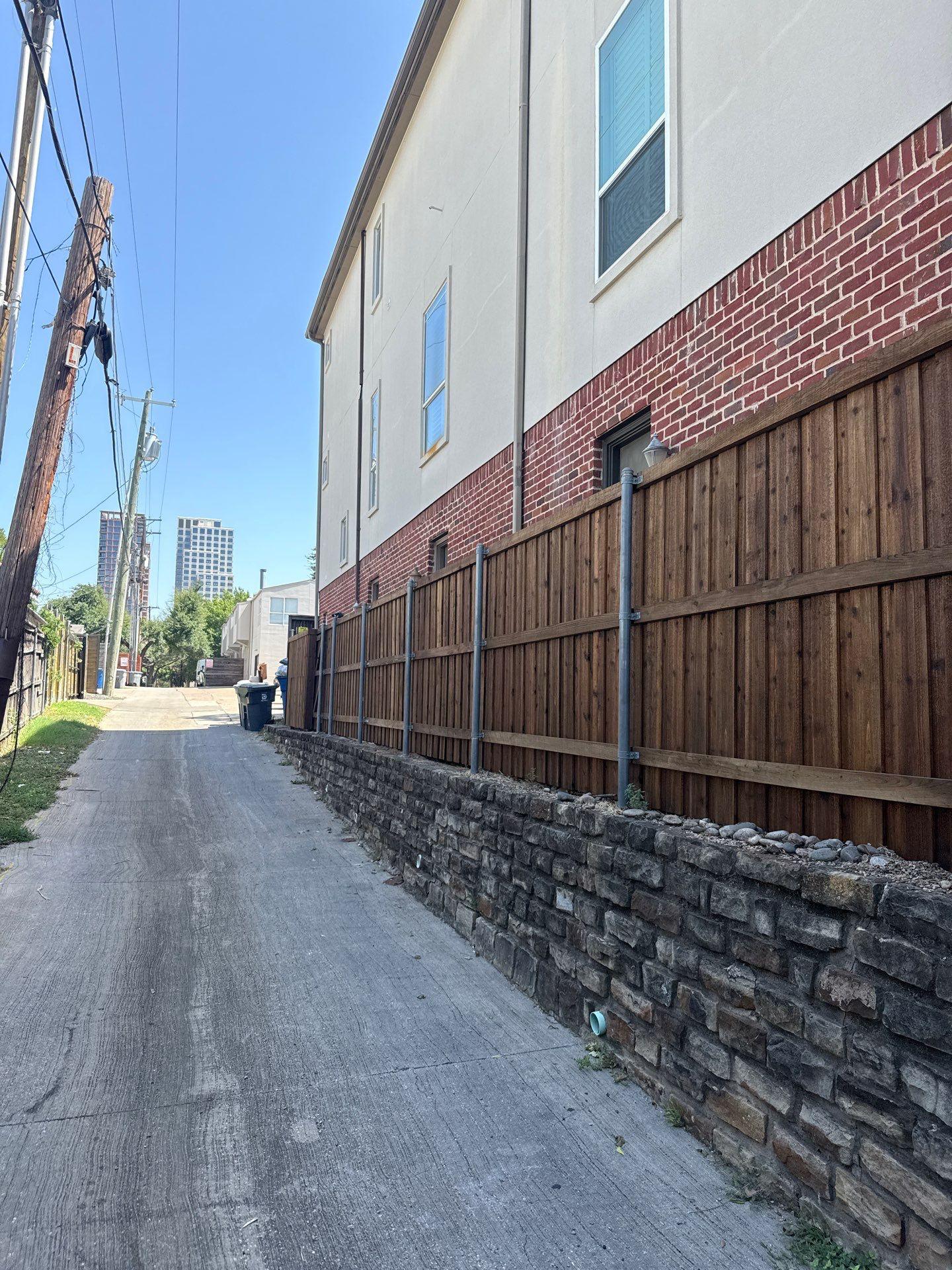 cedar board on board fence installed by top rail fence