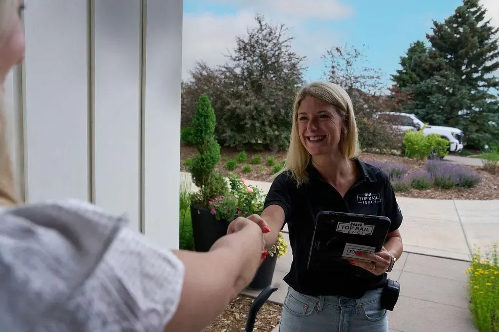 greeting customer at door