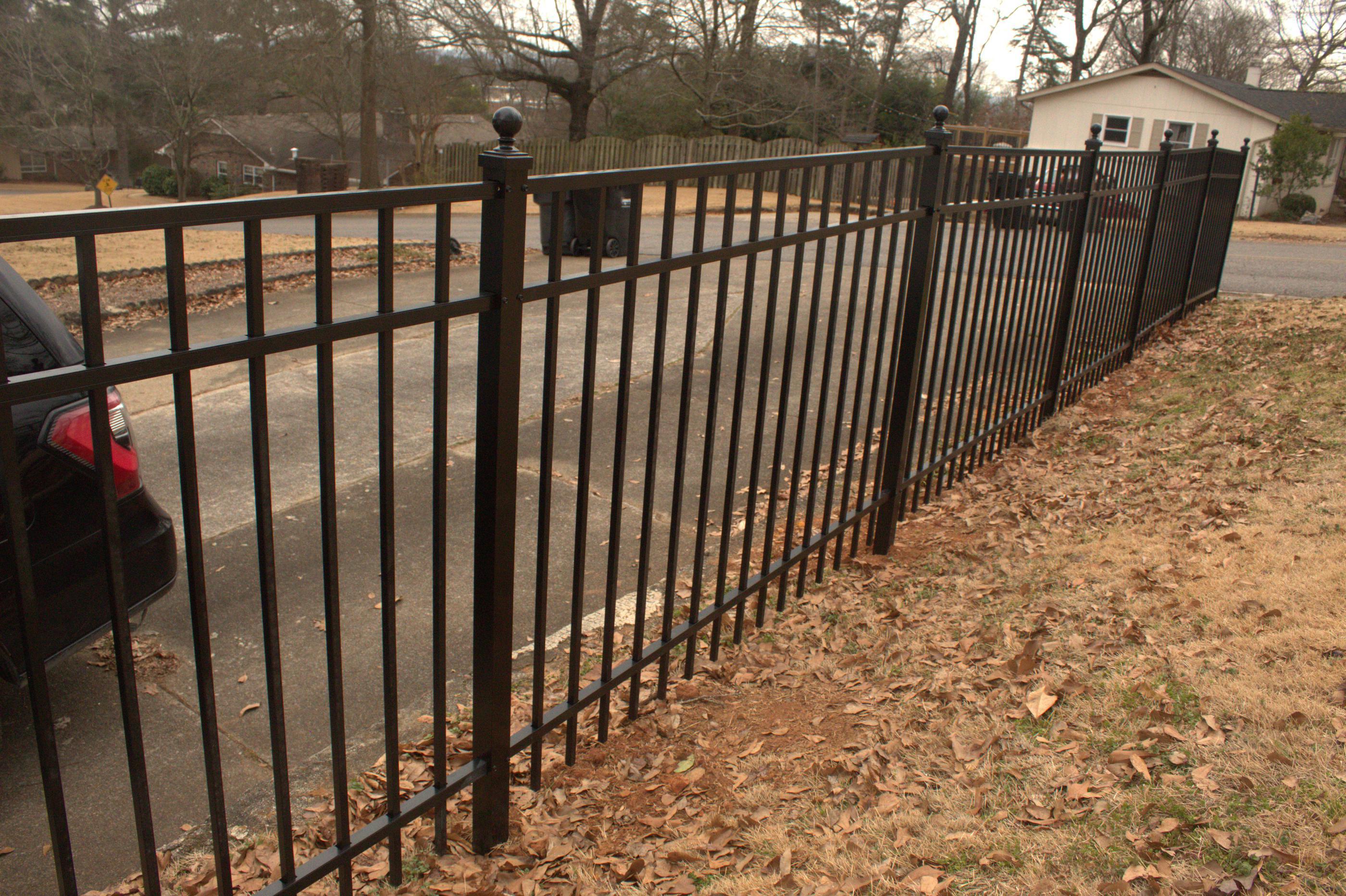 aluminum fence installed by top rail fence