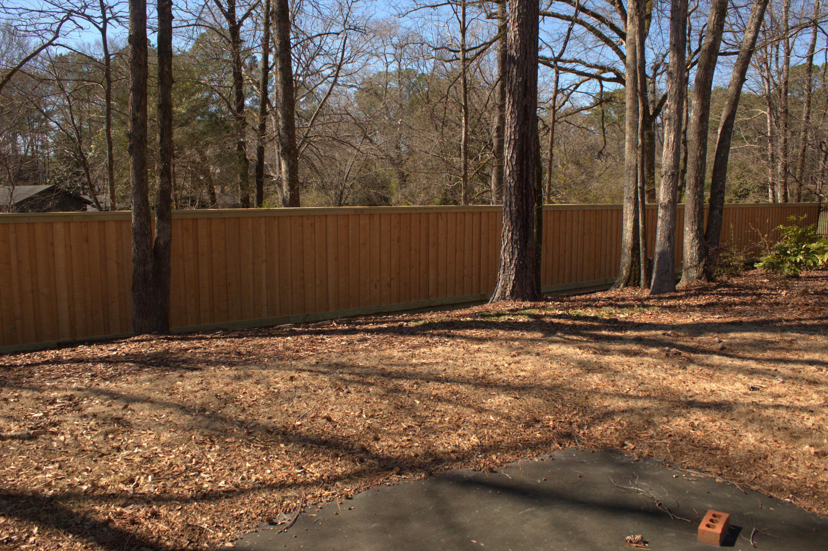 wood board on board fence installed by top rail fence