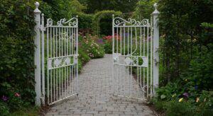 white wrought iron gate to garden