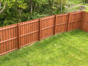 Wooden stained backyard fence