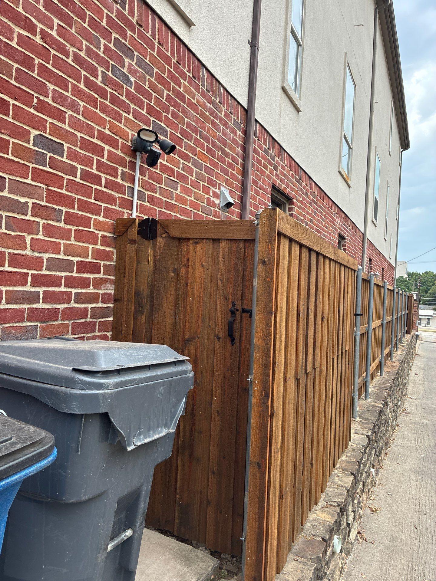 cedar board on board fence installed by top rail fence
