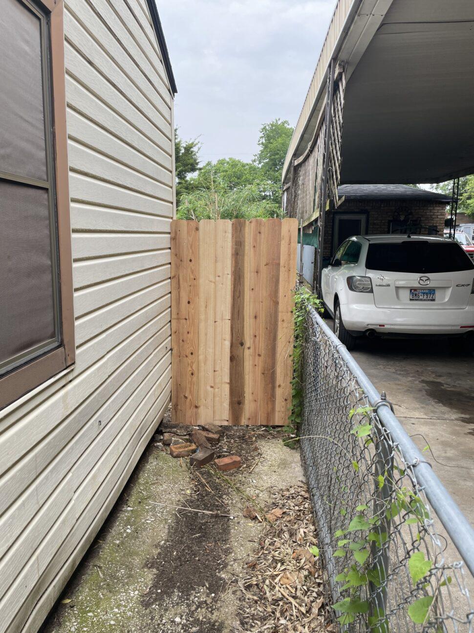cedar privacy fence installed by top rail fence