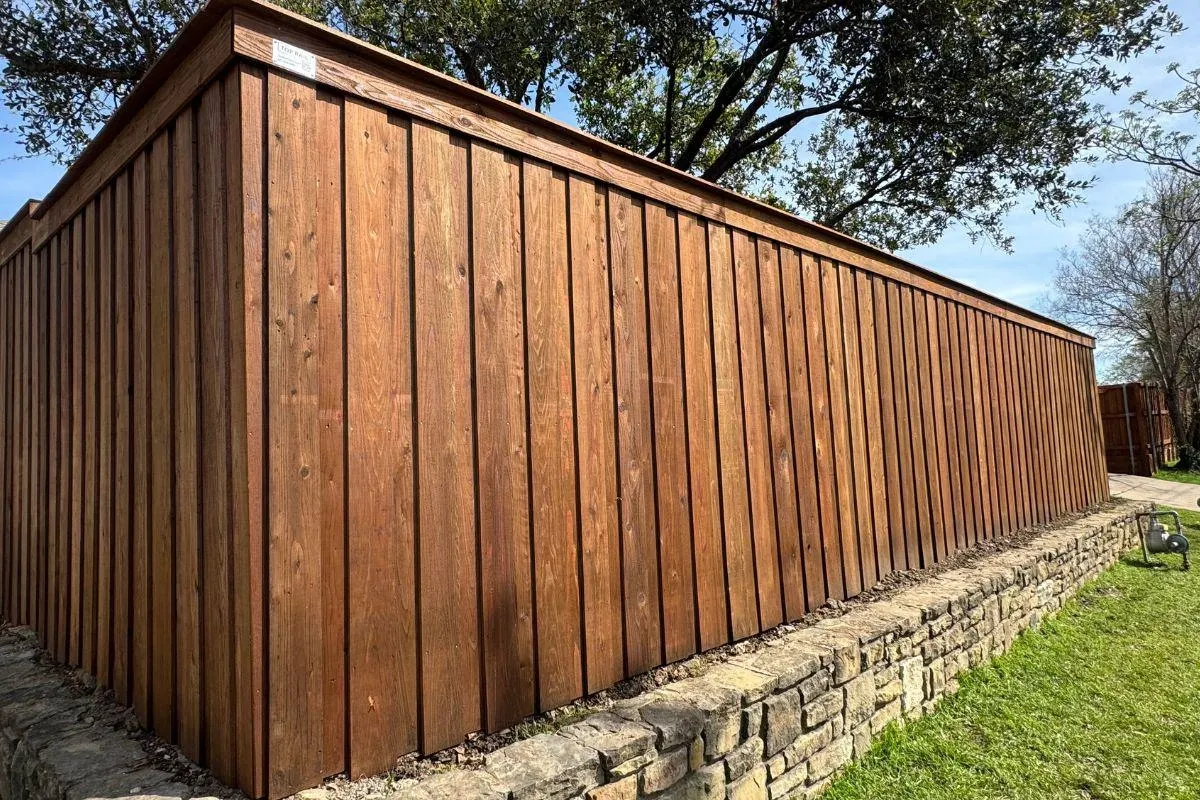 Board-on-board wood fence by Top Rail Fence