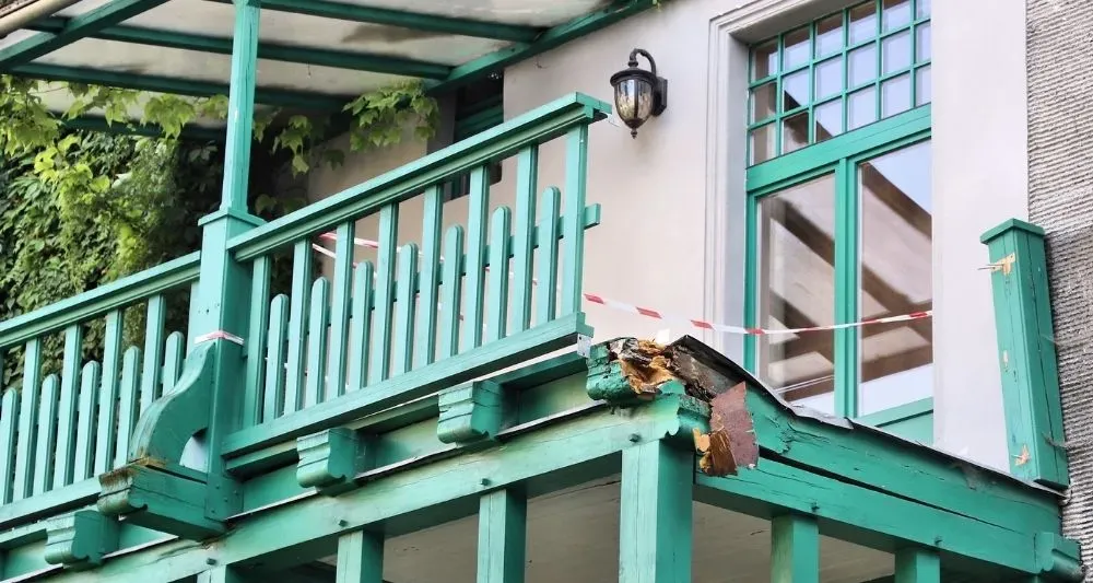 Broken Green Railing