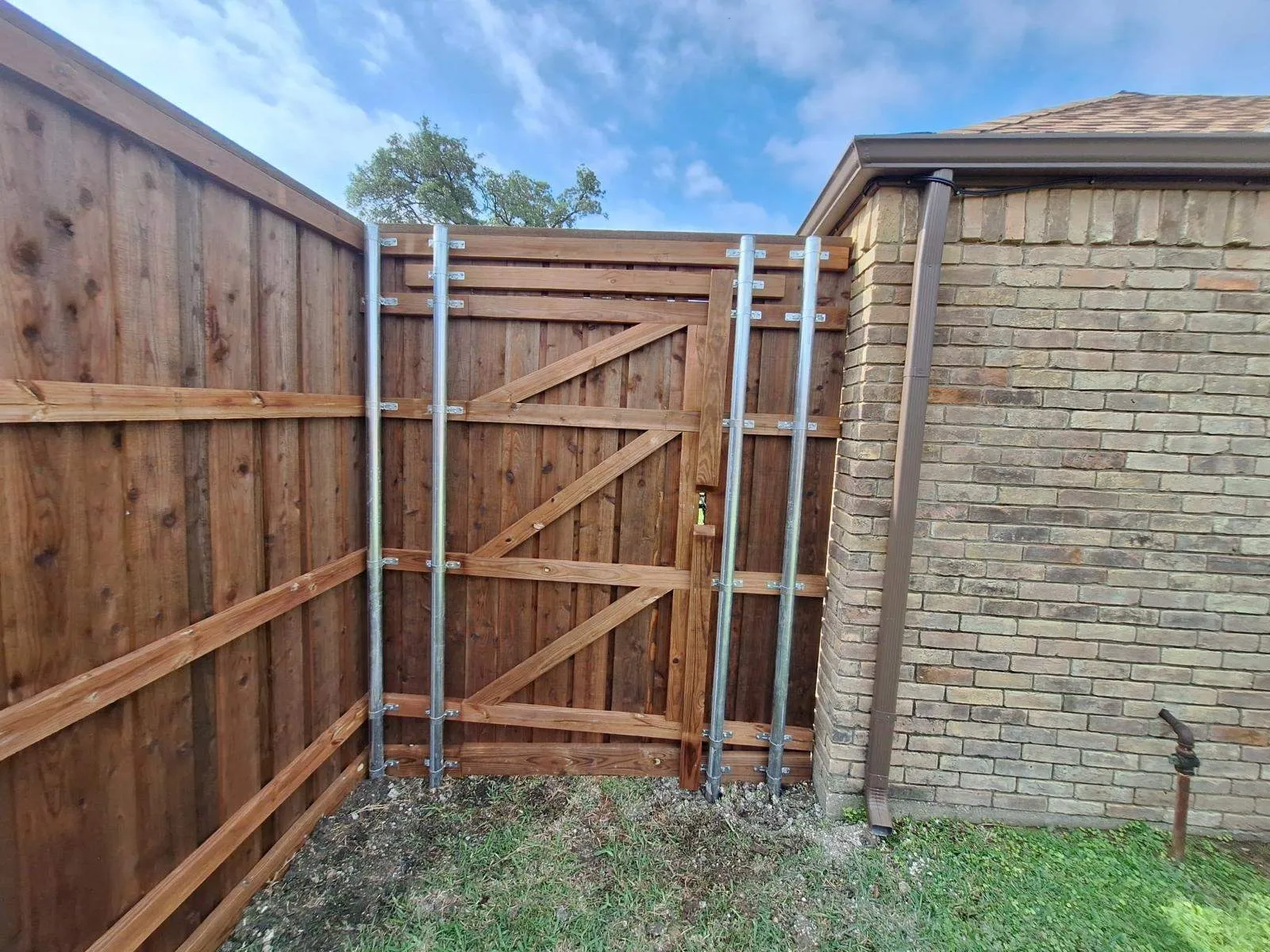 board on board fence installed by top rail fence