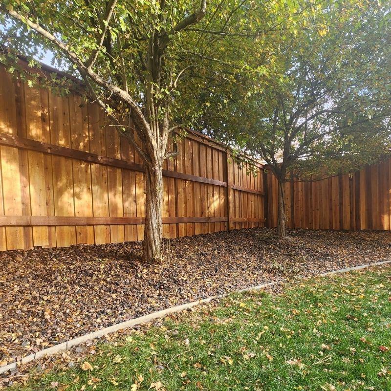 cedar fence installed by top rail fence