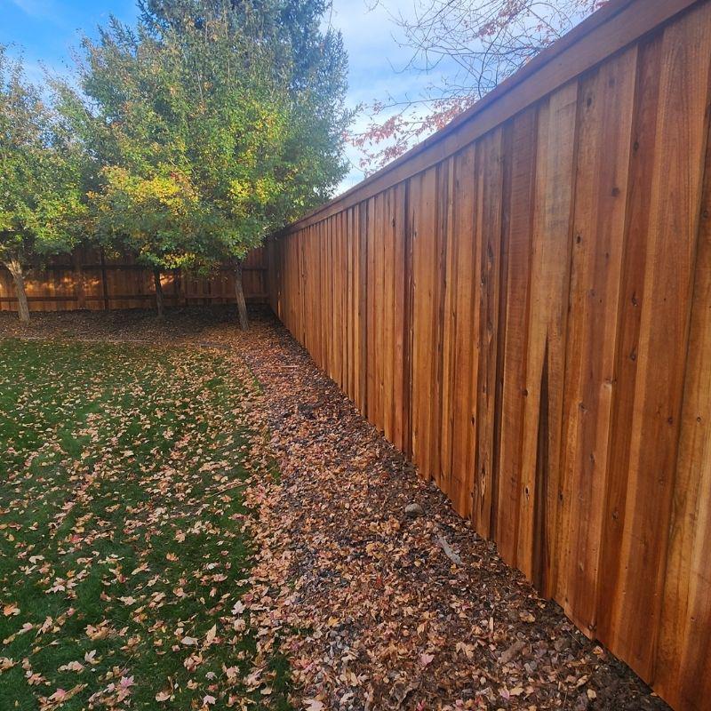 cedar fence installed by top rail fence