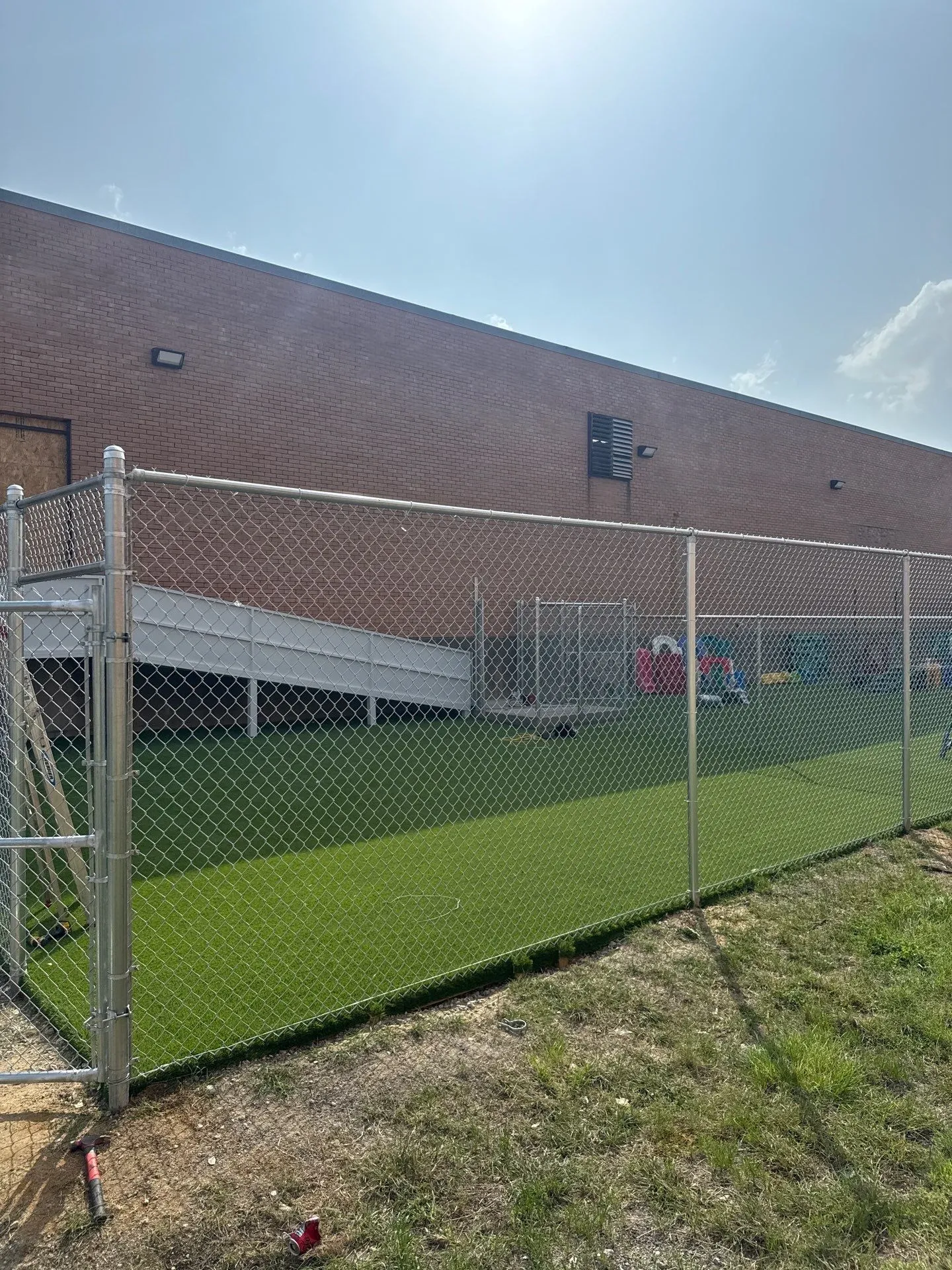 commercial fence installed by top rail fence
