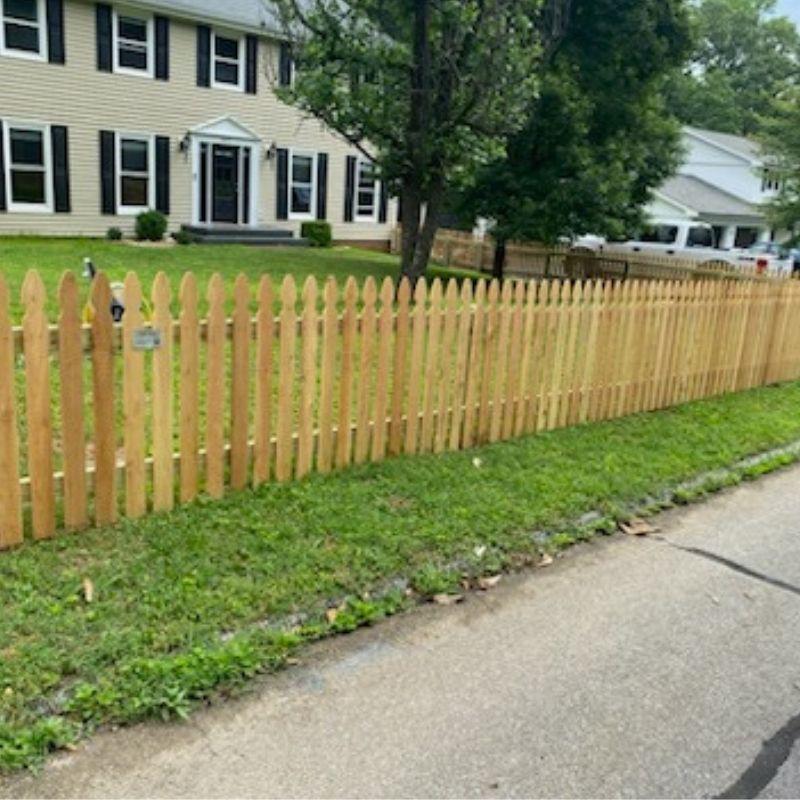 Cedar Gothic Picket Fence installation by Top Rail Fence