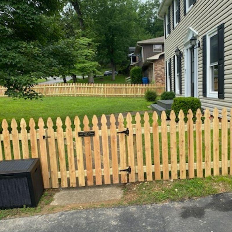 Cedar Gothic Picket Fence installation by Top Rail Fence