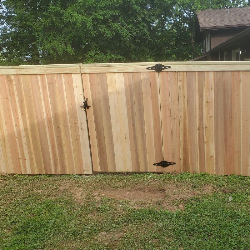 Wood Cedar Privacy Fence Install by Top Rail Fence
