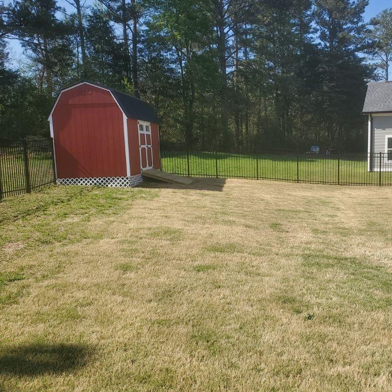Aluminum ornamental fence installed by Top Rail Fence
