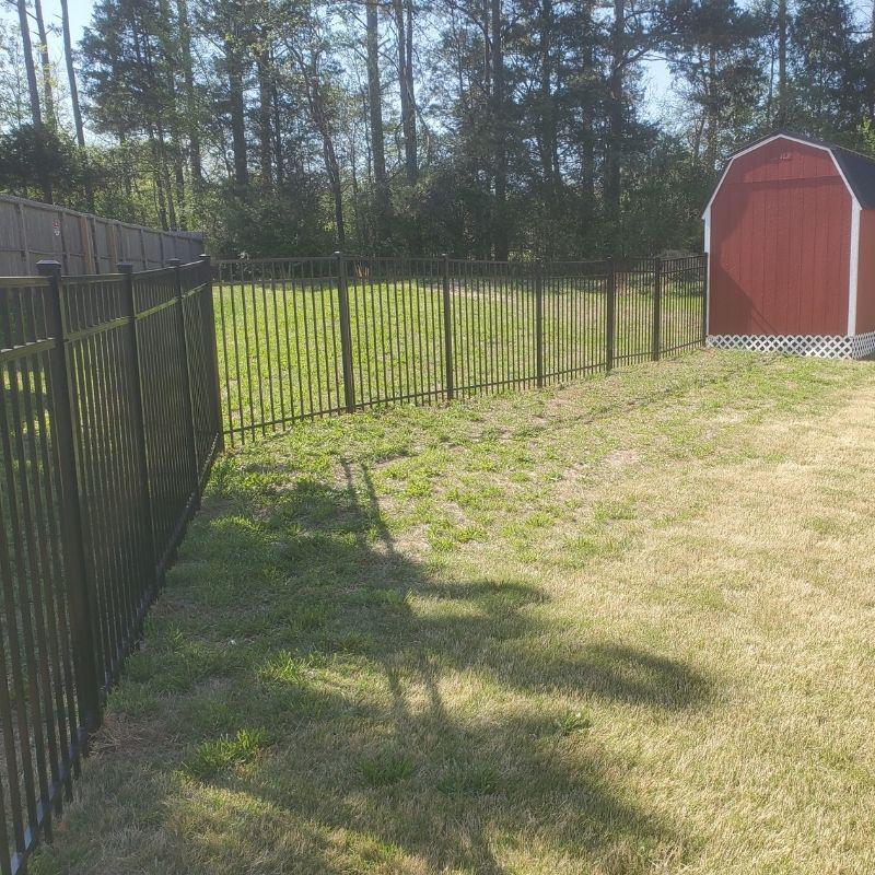 Aluminum ornamental fence installed by Top Rail Fence