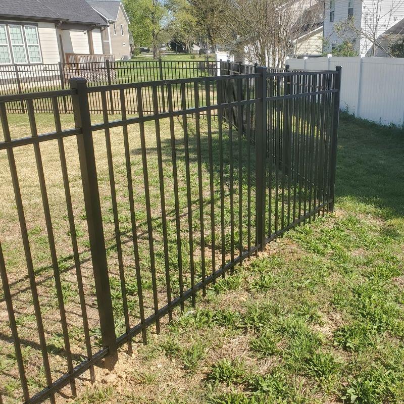 Aluminum ornamental fence installed by Top Rail Fence