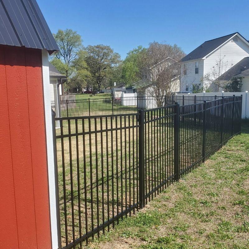 Aluminum ornamental fence installed by Top Rail Fence