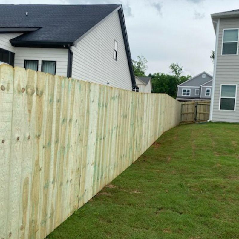 pine wood privacy fence installed by Top Rail Fence