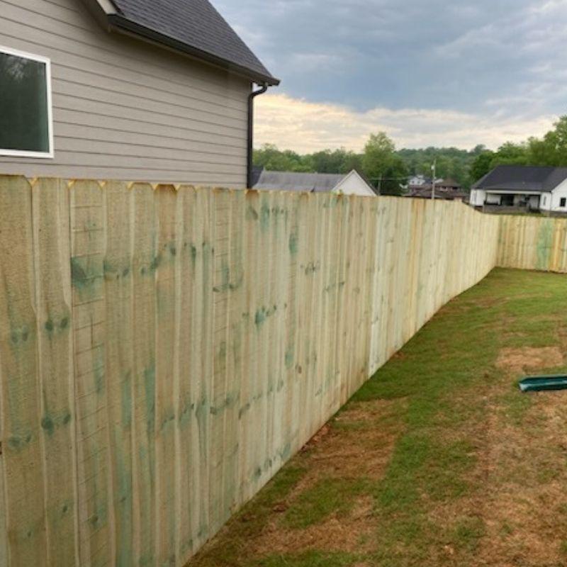 pine wood privacy fence installed by Top Rail Fence