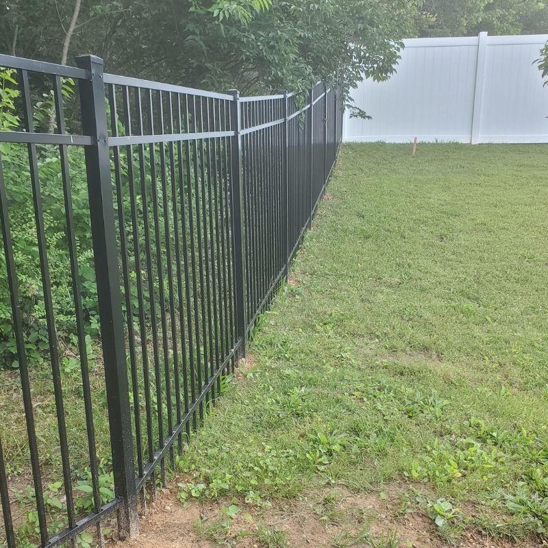 Vinyl Privacy & Ornamental Fence Installation by Top Rail Fence