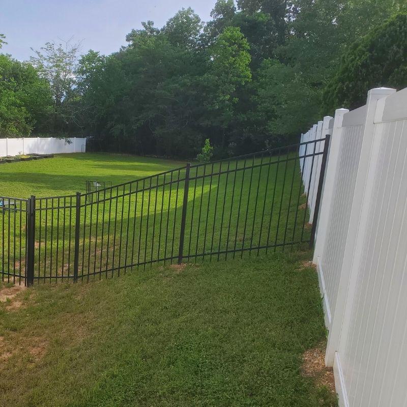Vinyl Privacy & Ornamental Fence Installation by Top Rail Fence