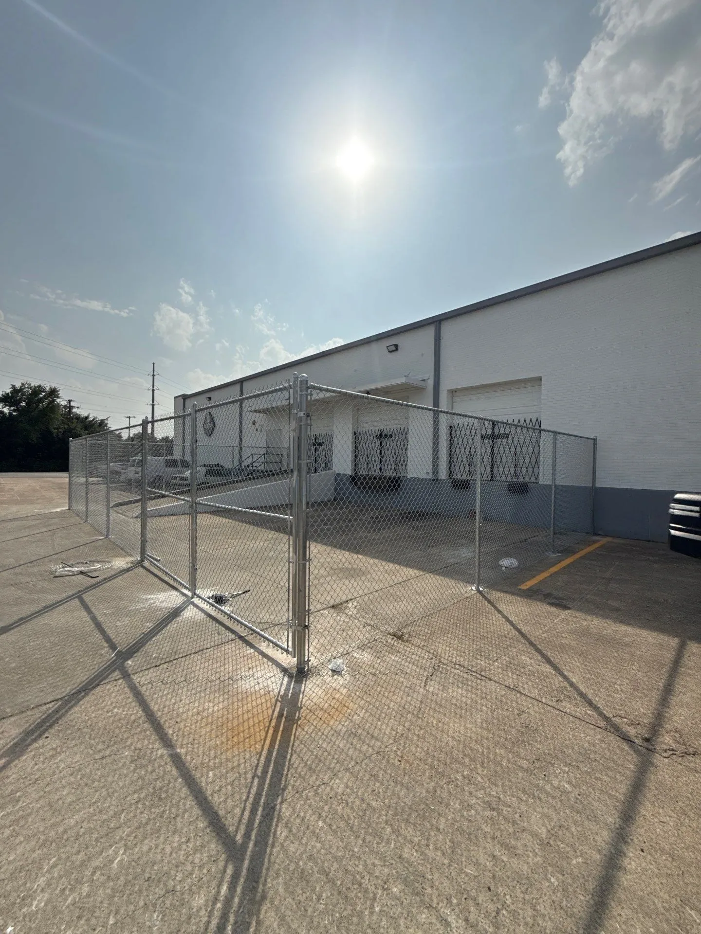 commercial fence installed by top rail fence